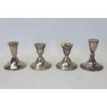 Pair filled sterling silver dwarf candlesticks with bell-shaped candleholders,