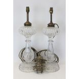 Impressive pair of late 19th / early 20th century oil lamps with cut glass reservoirs,