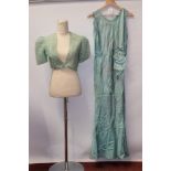 Ladies' 1930s green and silver long evening gown with bow and diamante clasp at waistline,