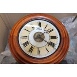 Victorian postman's wall clock striking on a bell, in pine case,