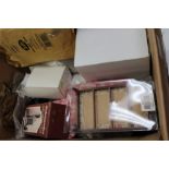 Quantity of mixed period dolls' clothes, socks and shoes, some dollhouse furniture,