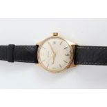 Gold (9ct) Garrard Automatic wristwatch on black leather strap CONDITION REPORT