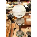 Edwardian Art Nouveau brass oil lamp with ceramic base and glass shade