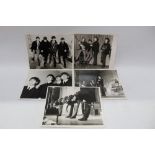 Photographs - black and white early photographs of The Beatles on and off stage (x 5),
