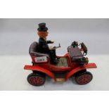 1960s tinplate Veteran car and driver