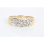 Gold (18ct) diamond set band ring with an interwoven design of brilliant cut and single cut