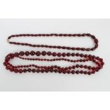 Two simulated cherry amber bead necklaces