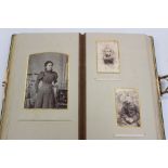 Victorian photographs in two albums - cartes de visite, cabinet cards, etc,