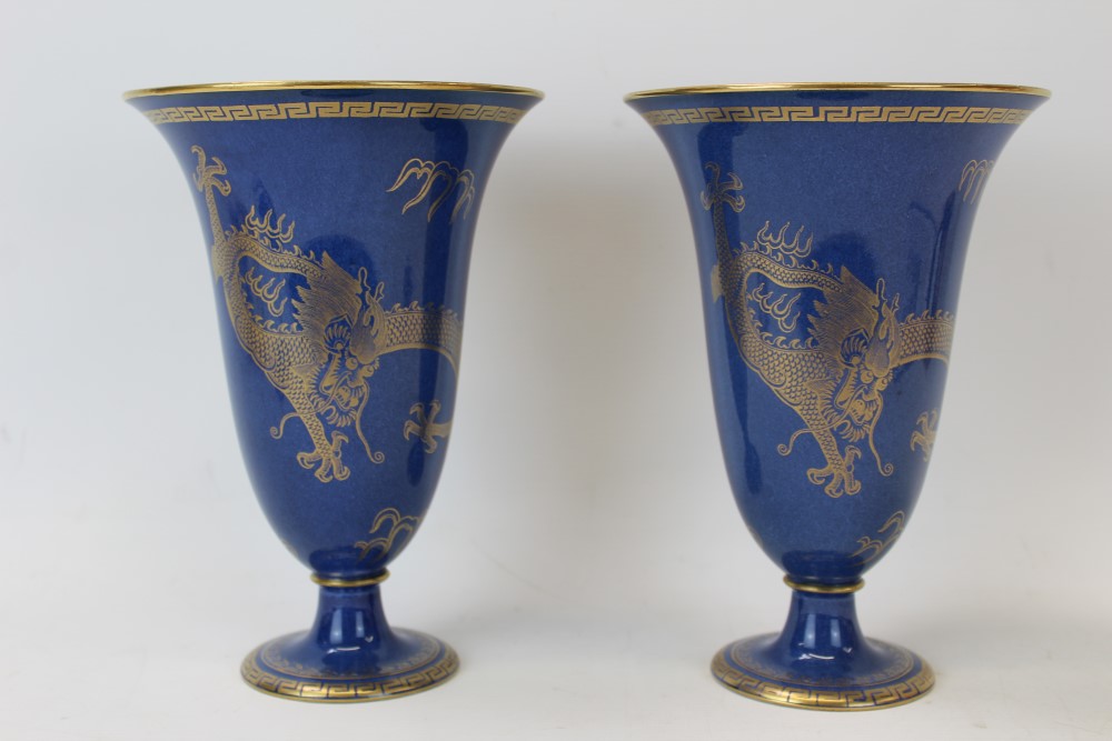 Pair of Wedgwood Dragon lustre vases, pattern no. 24616, with gilt dragons on a blue ground, 21.