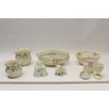 Selection of Belleek porcelain items - including basketweave bowls, vases, pig,
