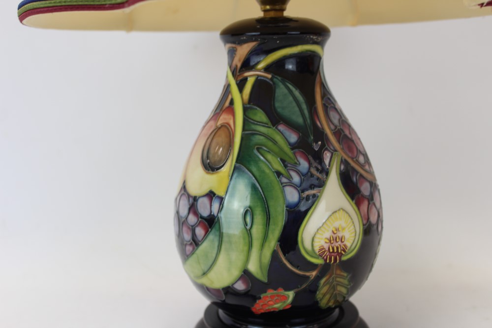Moorcroft pottery table lamp decorated in the Queens Choice pattern on blue ground, - Image 5 of 6