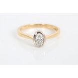 Diamond single stone ring with an oval cut diamond estimated to weigh approximately 0.