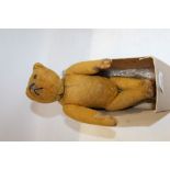 Small early teddy bears with wooden boot button eyes and small hump,