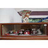 Glass display cabinet - containing vintage cars, aeroplanes, ships, miniature,