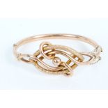 Victorian gold (9ct) hinged bangle with entwined scroll decoration CONDITION REPORT