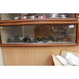 Glass display cabinet - containing three vintage cars by Burago and selection of miniature workshop