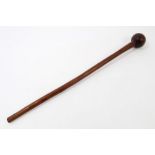 Antique African tribal throwing stick with bulbous end,