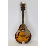 Columbus eight-string electric mandolin in original packaging