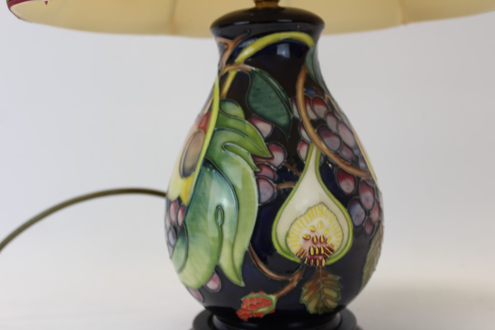 Moorcroft pottery table lamp decorated in the Queens Choice pattern on blue ground, - Image 2 of 6