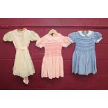 Selection of vintage little girl's clothes - including pink and white striped dress with