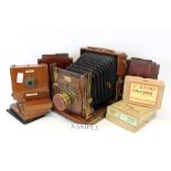 Two mahogany plate cameras - one a Lancaster Ajax,