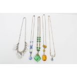 Five Art Deco crystal necklaces - including 'platinon' and amber glass necklace