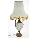19th century Continental porcelain and gilt metal mounted lamp with removable reservoir,