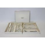 Mid-20th century Danish silver fish knives and forks - comprising twelve place settings - each