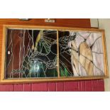 Large decorative stained glass panel depicting a rearing horse in landscape, in wooden frame,