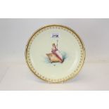 Mintons porcelain plate with hand-painted decoration - cherub on conch shell and gilt rim