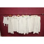 Selection of babies' christening gown, nighties and petticoats, white cotton with lace,