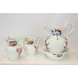 Coalport Feltspar porcelain wash jug and bowl with floral decoration and two other Coalport wash