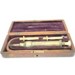 19th century brass enema syringe and fitments in mahogany case