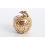 Gold (9ct) novelty Adam & Eve charm in the form of an apple,