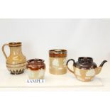 Collection of Royal Doulton stoneware items - including biscuit barrel with silver rim,