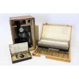 Aitchison microscope in a fitted case,