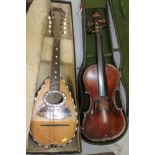 Antique Neapolitan barrel back mandolin in case and an antique violin (length of back excluding
