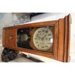 Early 20th century oak cased wall mounted clocking-in clock by International Time Recording Co. Ltd.
