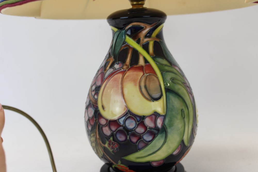 Moorcroft pottery table lamp decorated in the Queens Choice pattern on blue ground, - Image 3 of 6