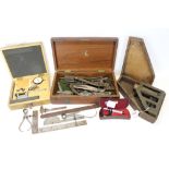 Military Watkins clinometer in a fitted case, together with a micrometer,