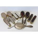 Selection of silver mounted dressing table hand mirrors and brushes (various dates and makers)