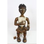 Mid-20th century African painted carving - a mother and child