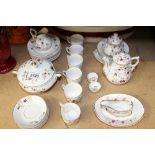 Victorian porcelain child's tea set with gilt rim and floral sprig decoration (27 pieces)