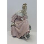 Large Lladro porcelain figure - seated lady holding a fan