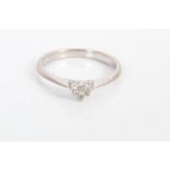 White gold (18ct) diamond set heart-shape ring with three brilliant cut diamonds weighing 0.