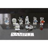 Collection of Swarovski crystal items - including Teddy bear with skis, Vase of roses, Owls,