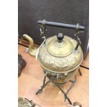 Two ships' type brass and glass hanging lanterns and Victorian brass spirit kettle on stand with