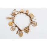 Gold (9ct) charm bracelet with various gold (9ct) charms CONDITION REPORT Total