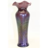 Loetz-style purple iridescent glass vase with flared rim,