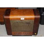 Vintage Ecko radio in walnut case, model A.